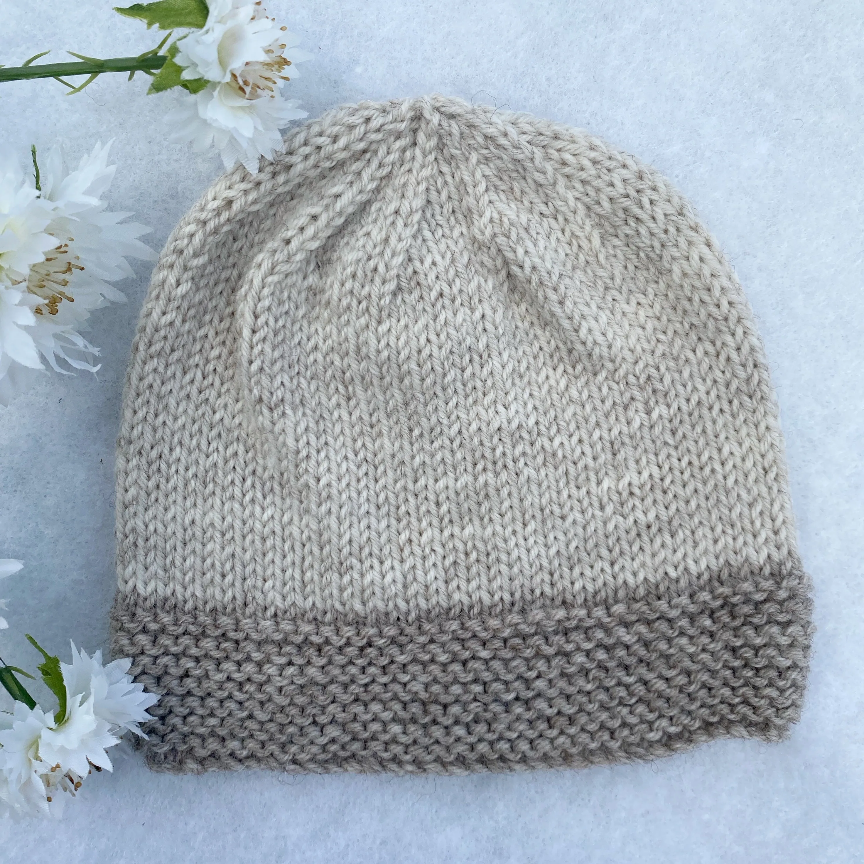 Assorted merino baby beanies and hats