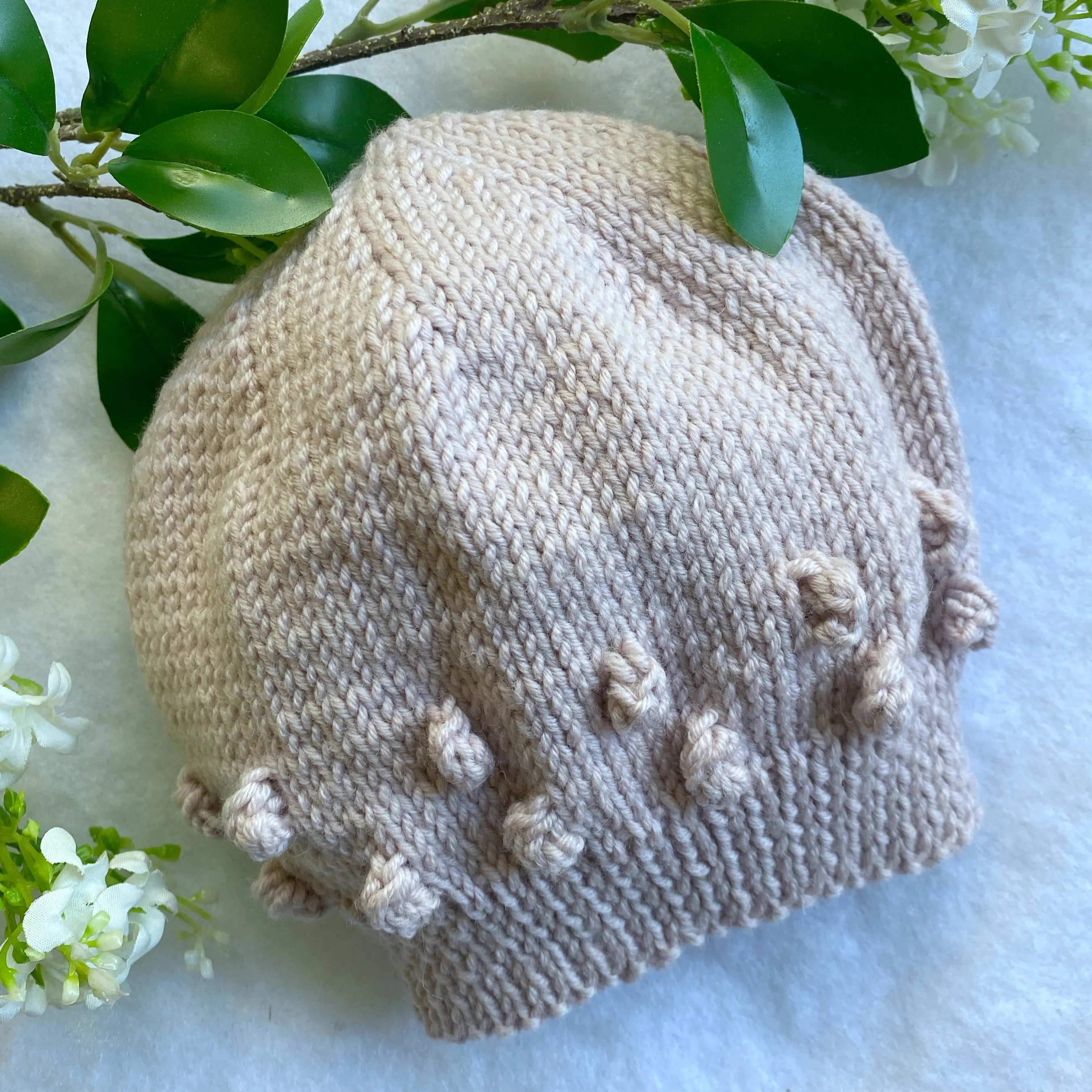Assorted merino baby beanies and hats