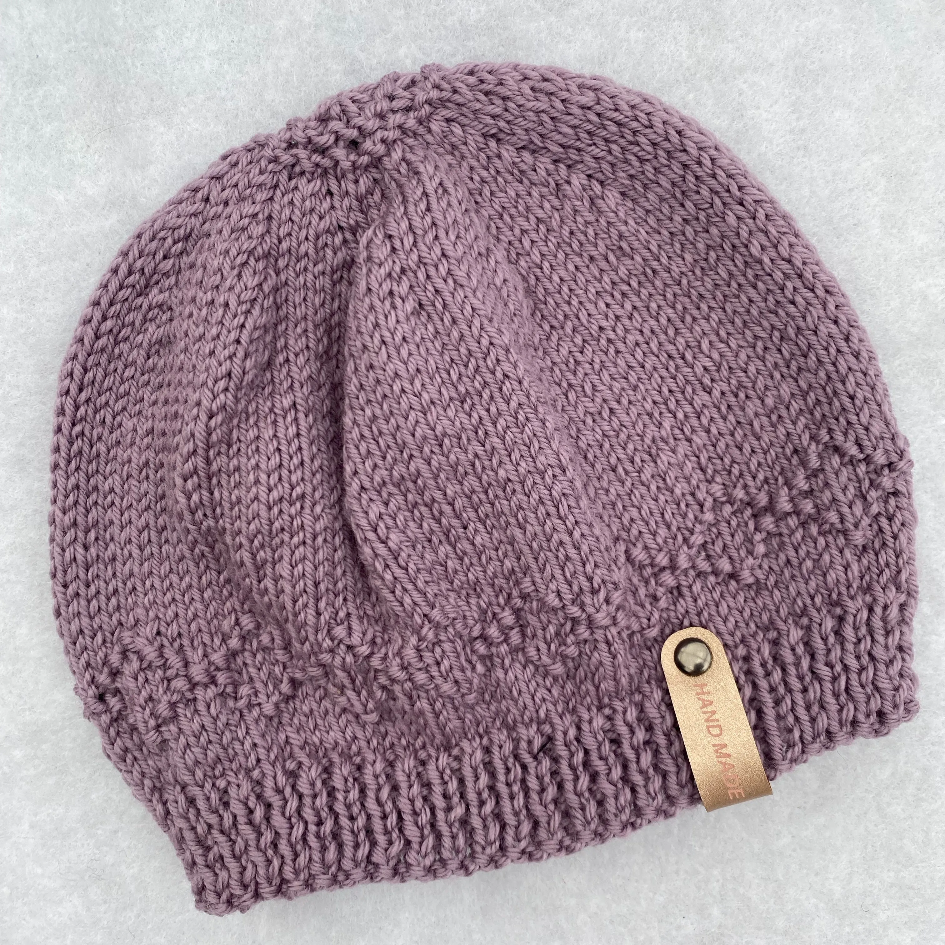 Assorted merino baby beanies and hats
