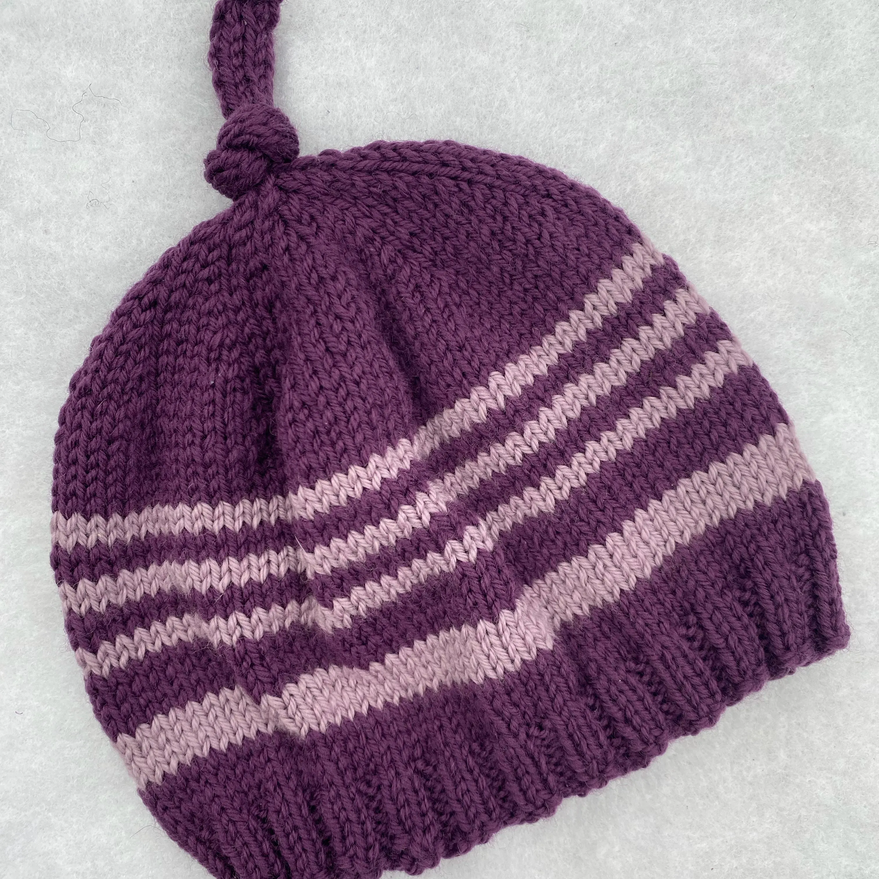 Assorted merino baby beanies and hats