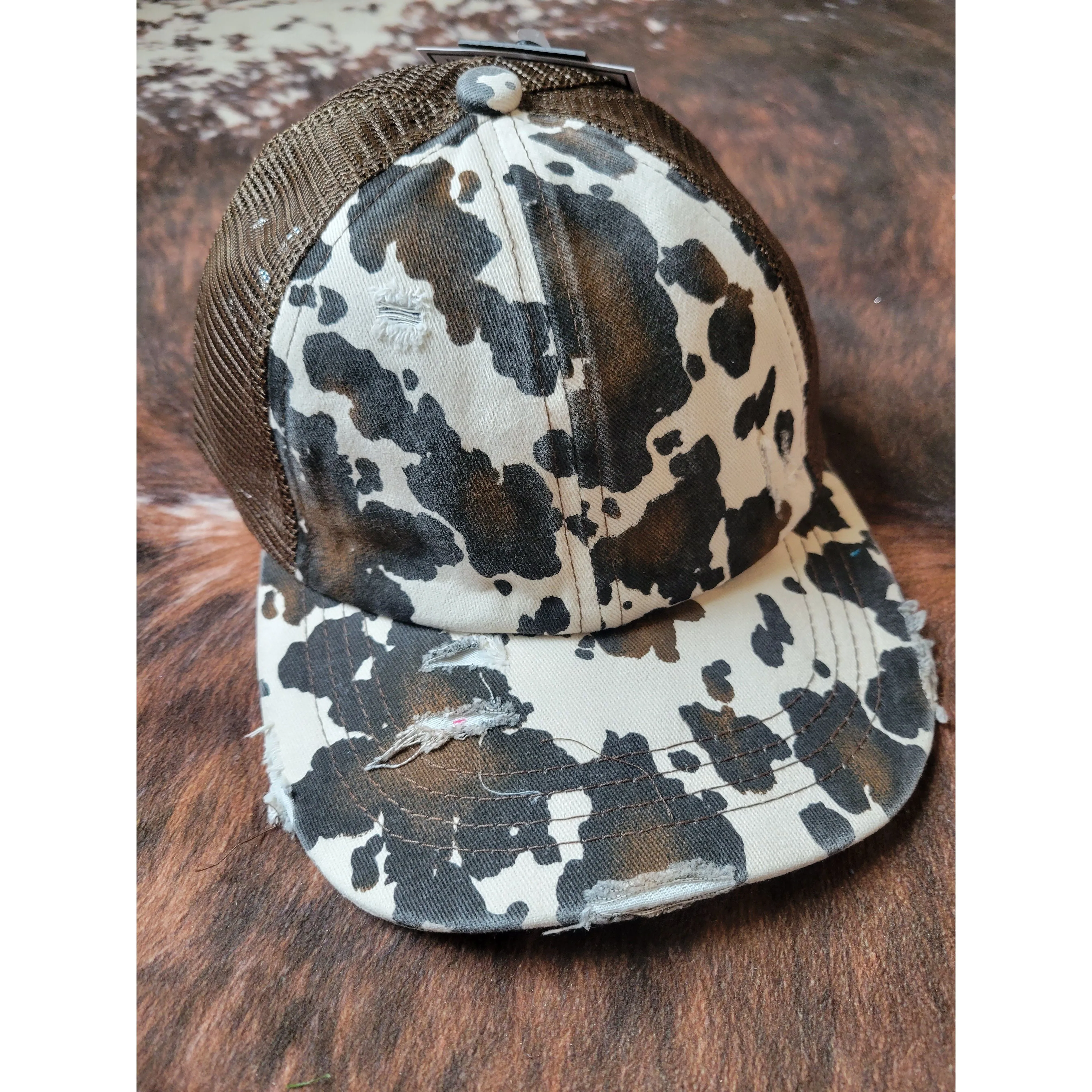C.C. Cow Print Criss Cross Ponytail Hat - Brown