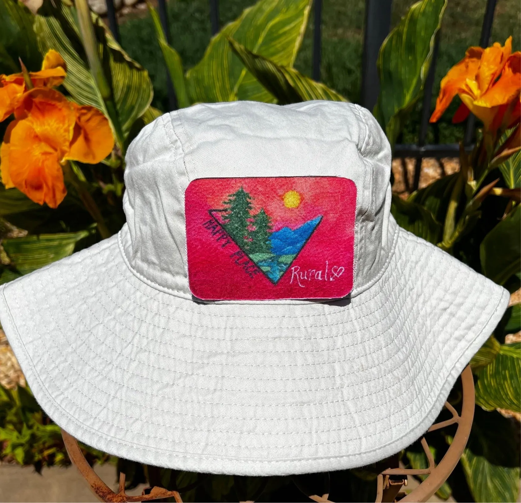 Rural Heart®️ by René Earnhardt “Happy Place”bucket hat featuring original art