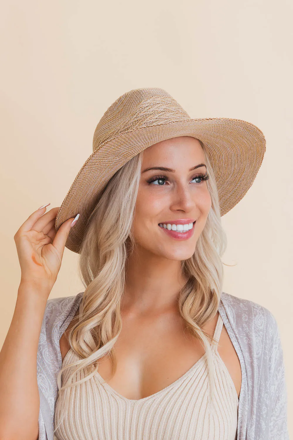 Straw Brimmed Hats.